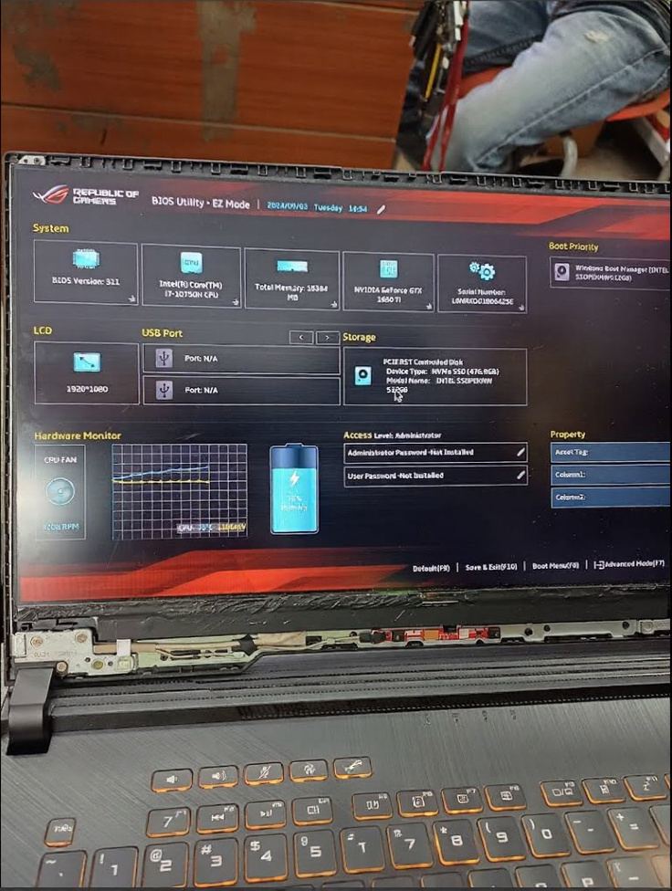 ASUS ROG gaming laptop opened up showing the BIOS utility screen