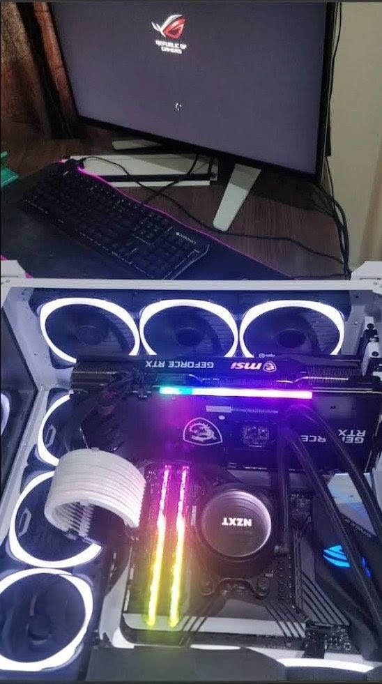 Custom white gaming PC build with RGB fans, MSI GeForce RTX graphics card and NZXT cooler