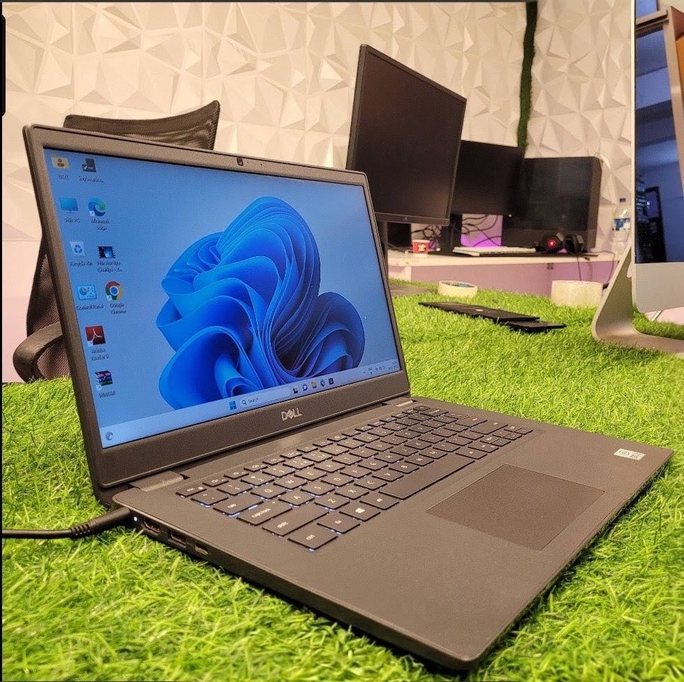 A Dell laptop repaired and tested at United Computer Services, running Windows 11